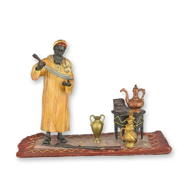 Bronzeskulptur orientalischer Jaeger mit Schwert auf Teppich