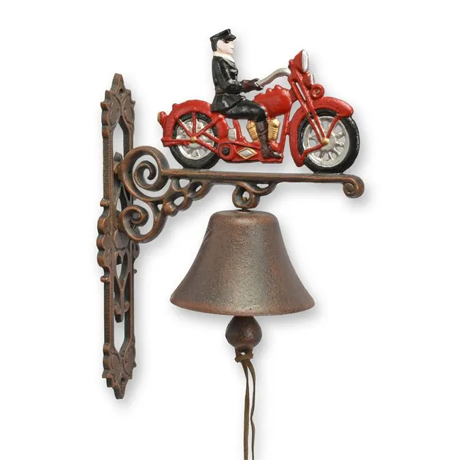 Gusseiserne Wandglocke mit rotem Motorrad und Fahrer