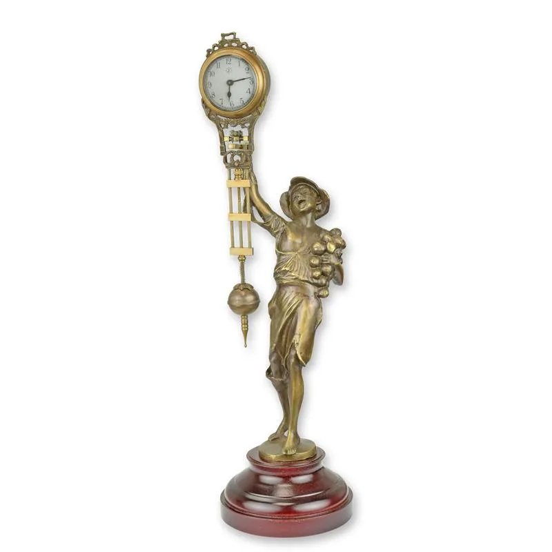Mysteriöse Tischuhr mit Bronzeknabe und Pendel